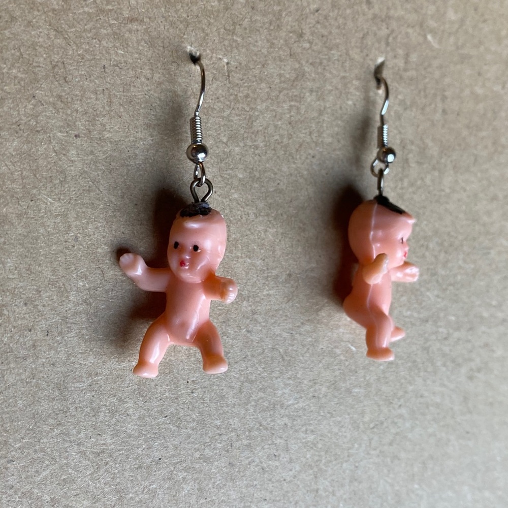 Baby earrings, white baby.